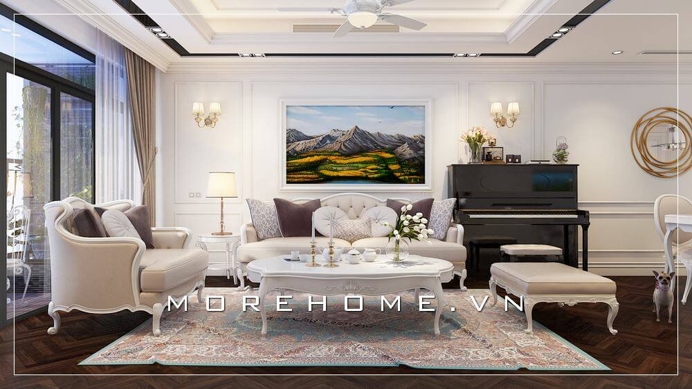 Trang trí nội thất phòng khách chung cư ấn tượng phong cách tân cổ điển với tone màu trắng được sử dụng tạo điểm nhấn cho các đường nét trạm khắc tinh xảo và khéo léo. Thiết kế nội thất