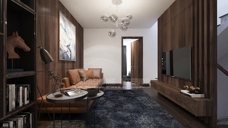 Điểm nhấn sofa da màu cam ấn tượng cho phòng khách hiện đại trang trí tường từ gỗ ốp tối màu. Các mẫu thiết kế phòng khách mĩ miều nhất 2020