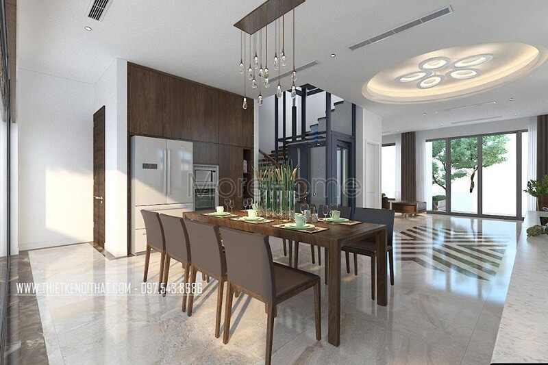 Thiết kế phòng ăn biệt thự hiện đại với bộ bàn ăn gỗ tự nhiên tạo điểm nhấn nổi bật cho không gian thiết kế biệt thự