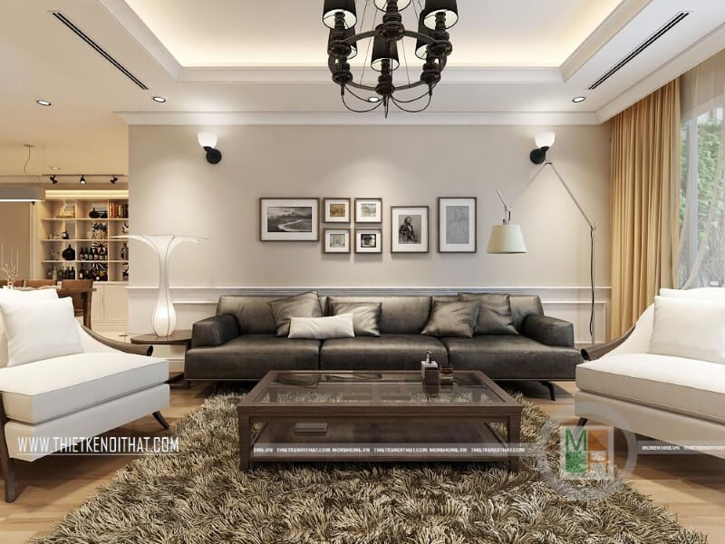 Mẫu thiết kế nội thất phòng khách hiện đại cho chung cư với bộ sofa da cao cấp màu đèn, trắng tạo điểm nhấn nổi bật cho căn phòng. Thiết kế phòng khách tại Hà Nội
